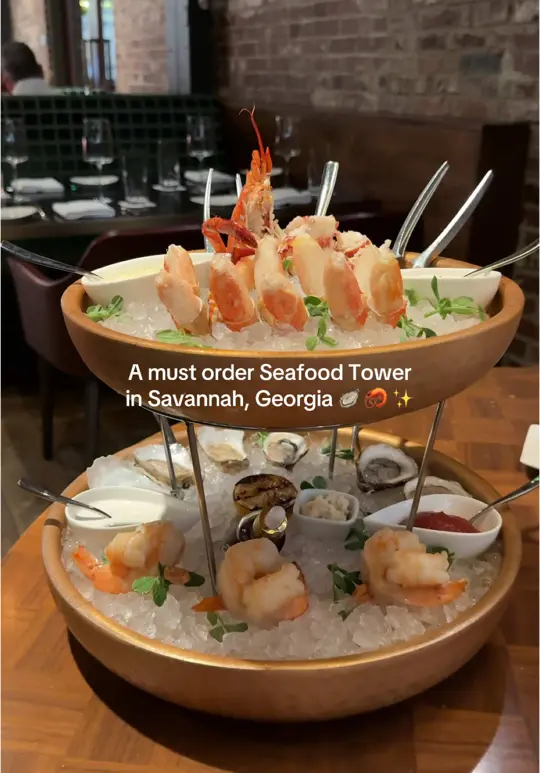 District Seafood in Savannah showing seafood tower, oysters, shrimp, video by thelongweekender on TikTok