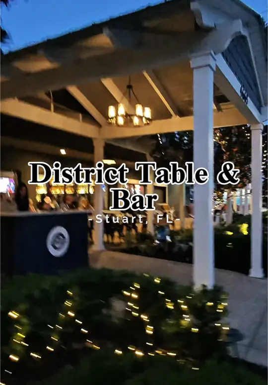 District Table and Bar in Stuart showing review, visit, deviled eggs, mexican street corn, bread of the day, sweet tea chicken, district burger, video by jeriekaewing on TikTok