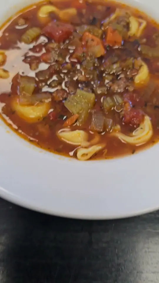 Dobro's Restaurant in Deland showing drinks, sangria, food, sausage tortellini, cream of mushroom soup, chicken and rice, video by Dobro's Restaurant on Facebook