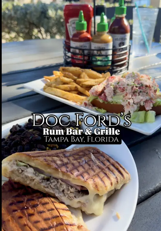 Doc Ford's Rum Bar And Grille St Pete Pier in St. Petersburg showing atmosphere, waterfront views, lobster roll, cuban sandwich, tropical cocktails, live music, video by thingstodotampabay on TikTok