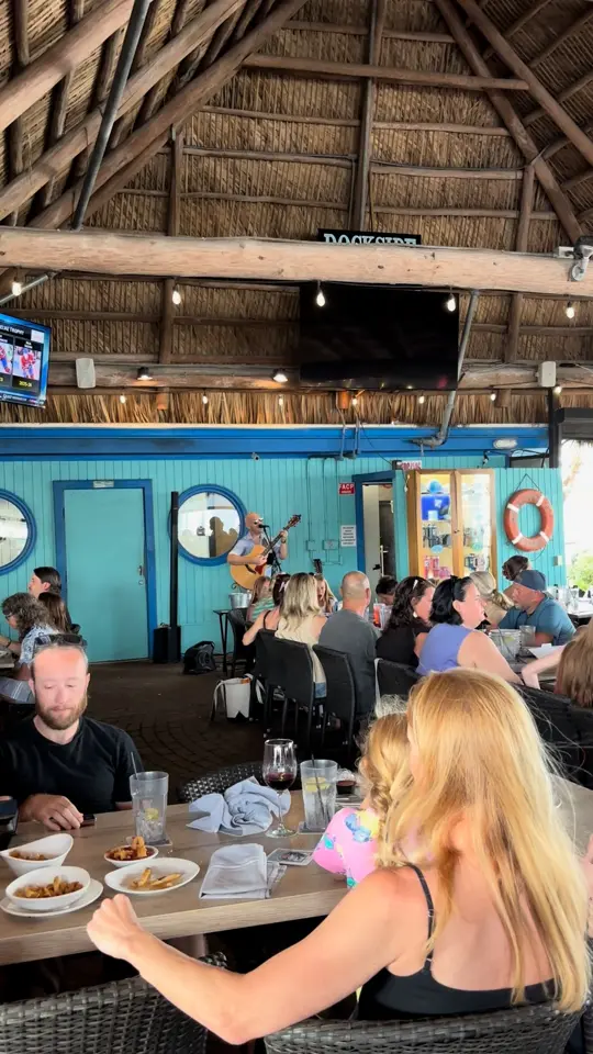 Dockside Waterfront Grill in Venice showing live music, waterfront views, food and drinks, video by Dockside Waterfront Grill on Facebook