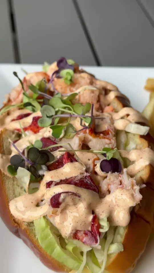Dockside Waterfront Grill in Venice showing food, lobster roll, restaurant atmosphere, video by docksidekitchen on TikTok