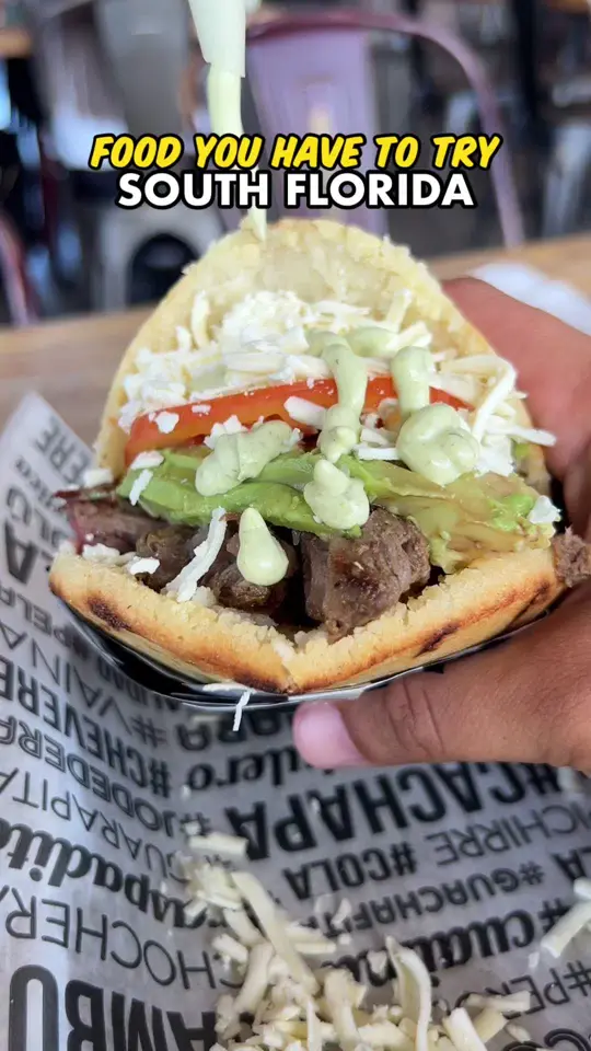 Doggi's Arepa Bar in Miami showing food, arepa santa barbara, video by josiaheats on TikTok