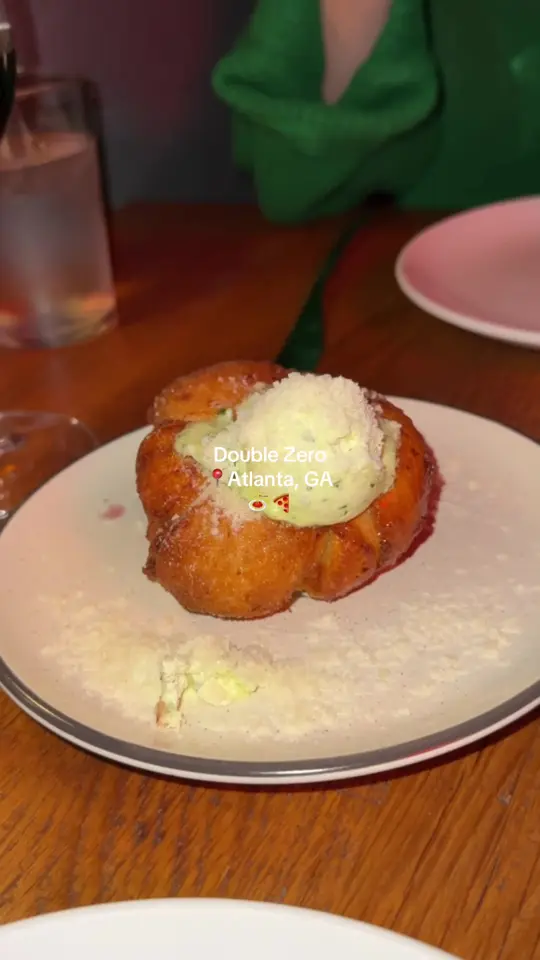 Double Zero in Atlanta showing pizza, pasta, garlic knot, meatballs, olive oil cake, video by eatswith.em.and.mj on TikTok