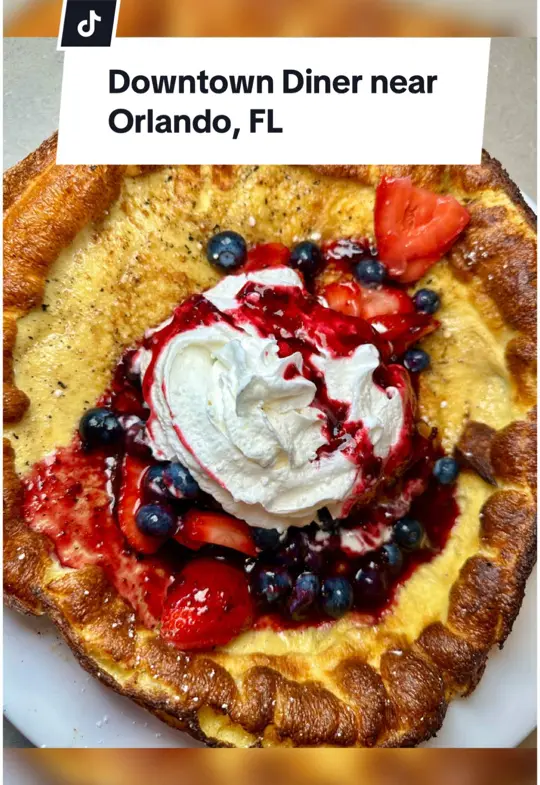 Downtown Diner in Celebration showing restaurant visit, classic diner atmosphere, 80s decor, breakfast all day, lunch options, dutch baby pancakes, video by christinainitalia on TikTok