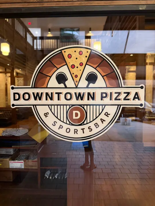 Downtown Pizza Sports Bar and Grill in Clearwater showing kegerator installation, sign installation, venue opening, video by Downtown Pizza & Sportsbar on Facebook