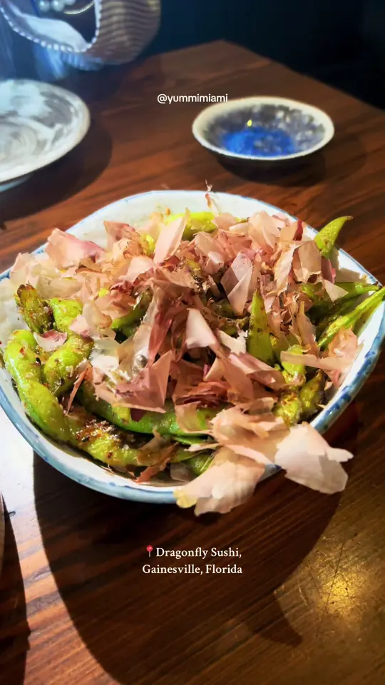 Dragonfly Sushi & Sake Company in Gainesville showing sushi, crispy crunch roll, sautéed edamame, the bomb roll, video by yummimiami on TikTok
