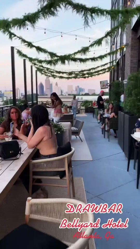 Drawbar in Atlanta showing rooftop bar, visit, video by _atlist on TikTok