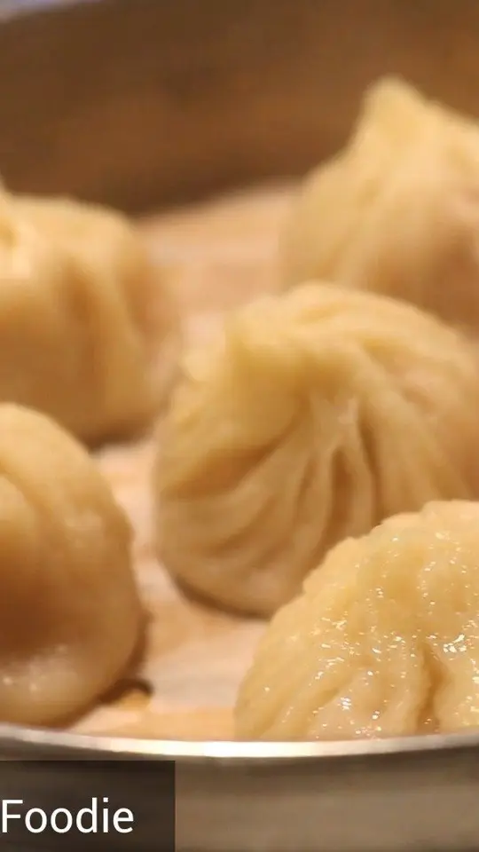Dumpling House in Duluth showing review, pan-fried dumplings, shanghai soup dumplings, video by Asheville Foodie Community on Facebook