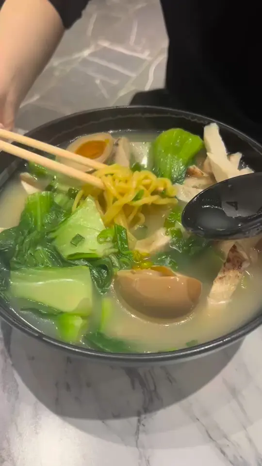 Dumpling Master in Cumming showing grand opening, free drinks, robot server, video by Dumpling Master on Facebook