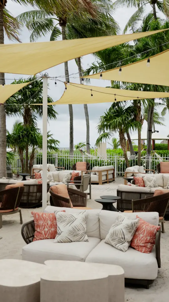 Dune Beach Bar in Key Biscayne showing atmosphere, cocktails, coastal fare, video by The Ritz-Carlton Key Biscayne, Miami on Facebook
