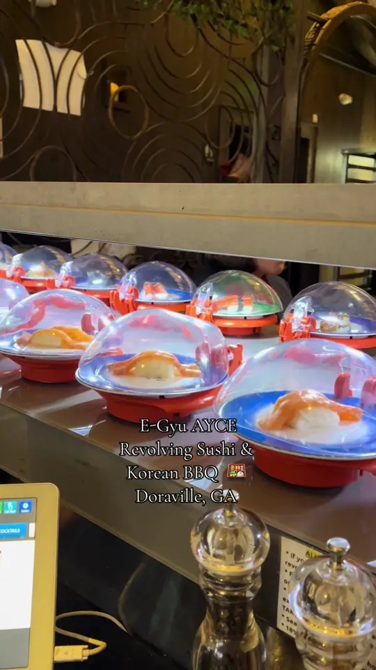 E-Gyu All You Can Eat Revolving Sushi & Korean BBQ - Doraville in Atlanta showing restaurant, all-you-can-eat sushi, korean bbq, wagyu, red snapper, lamb, video by theskylarguide on TikTok