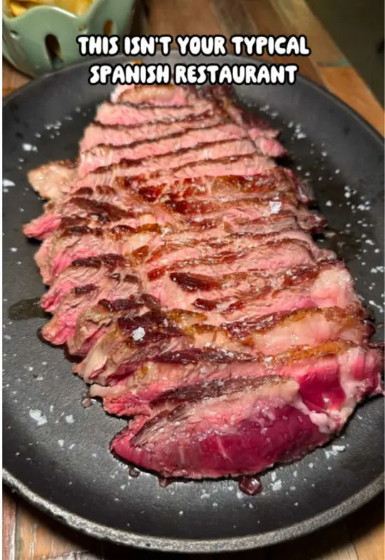 Edan Bistro in North Miami showing review, jamón ibérico, mushroom croquetas with black garlic sauce, scallop cracker, 30 oz dry-aged ribeye, pumpkin creamy rice, video by iviethefoodie on TikTok