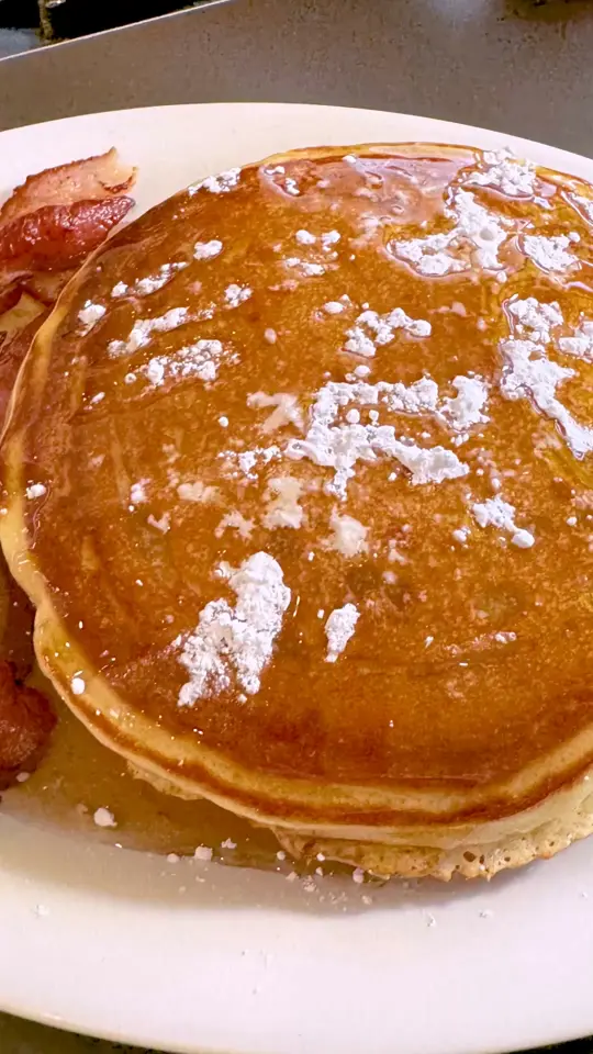 Eggs Up Grill in Cocoa Beach showing food, buttermilk pancakes, video by Eggs Up Grill on Facebook