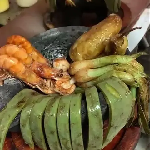 El Fogon Cantina & Grill in Dacula showing food, molcajete, video by El Fogon Cantina & Grill on Facebook