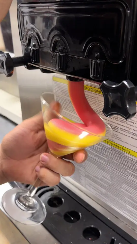 El Potro Mexican Restaurant in Orlando showing drink, strawberry & mango swirl soft serve margarita, video by elpotrorestaurant on TikTok