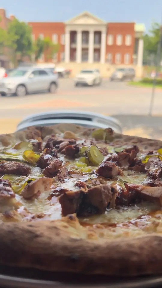 Ellijay Wood Fired Pizza in Ellijay showing pizza, wood-fired pancetta-wrapped calabrian wings, video by Pick Ellijay on Facebook