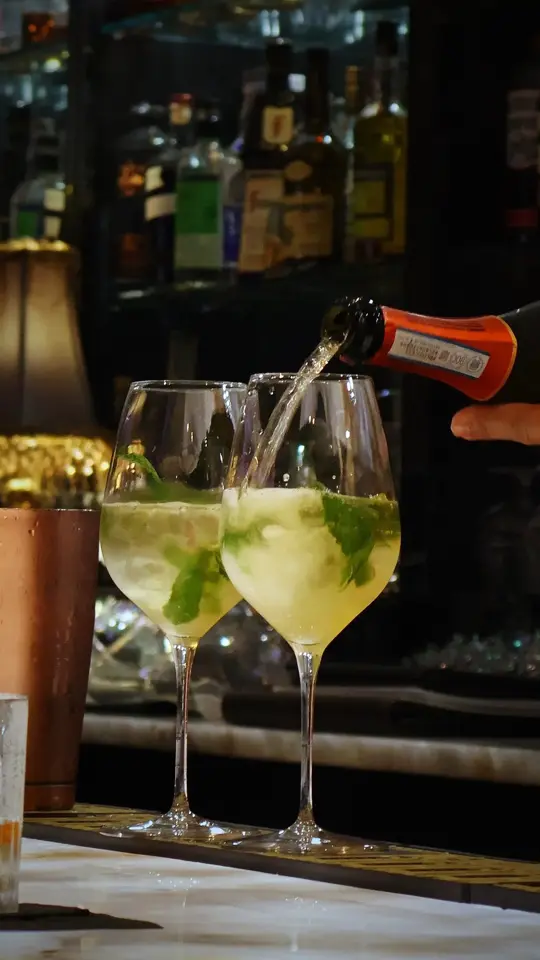 Escargot 41 in Naples showing restaurant opening, cocktails, french-style piano bar, video by Escargot41 on Facebook