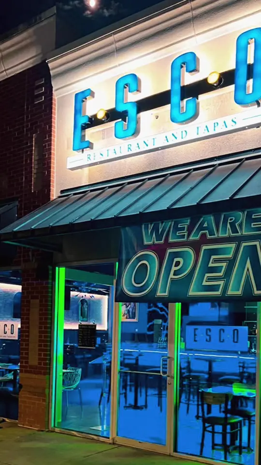 Esco Marietta Restaurant and Tapas in Austell showing review, visit, atmosphere, food, fried catfish over gouda grits with beef sausage cream, video by morekingjb on TikTok