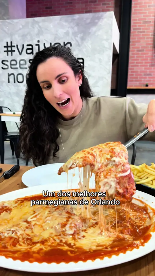 Eskina Brazilian Restaurant in Kissimmee showing restaurant visit, brazilian food, parmesan chicken, family-friendly atmosphere, video by giejoao_ on TikTok
