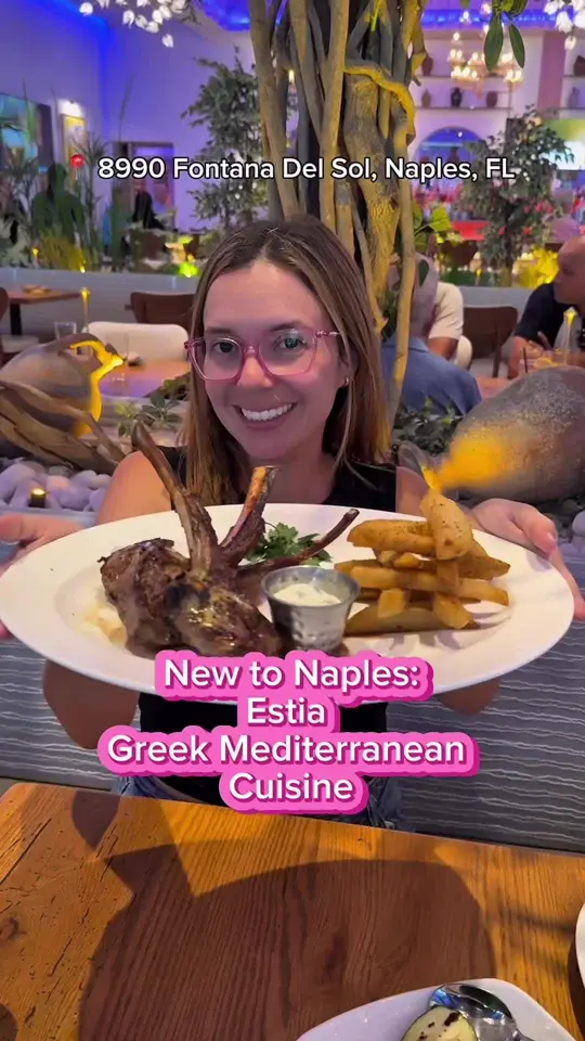Estia in Naples showing restaurant visit, greek food, chips, octopus, flaming cheese, south african prawns, lamb chops, salad, dubai sundae, baklava, video by loveswfl on TikTok
