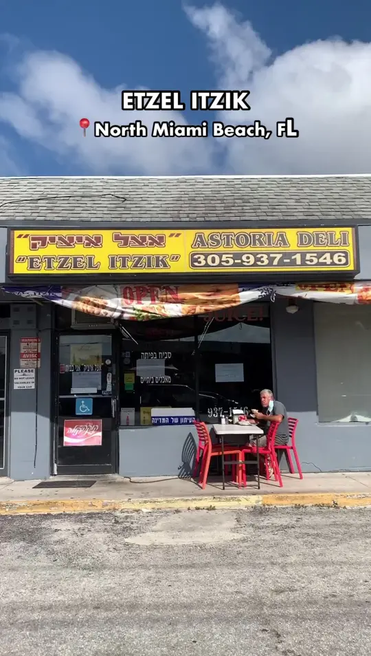 Etzel Itzik Deli in Miami showing restaurant visit, israeli food, limonada, appetizer platter, video by Josiah Eats on Facebook