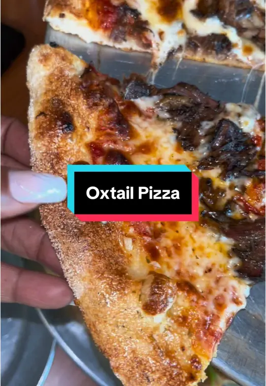 F1F4 Pizza Bar in Stone Mountain showing pizza, oxtail pizza, video by yourfinancegirl19 on TikTok
