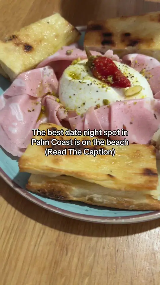 FARO Beachside Eatery in Flagler Beach showing review, visit, burrata, charcuterie board, shrimp salad, artisan pizzas, video by placeforparents on TikTok