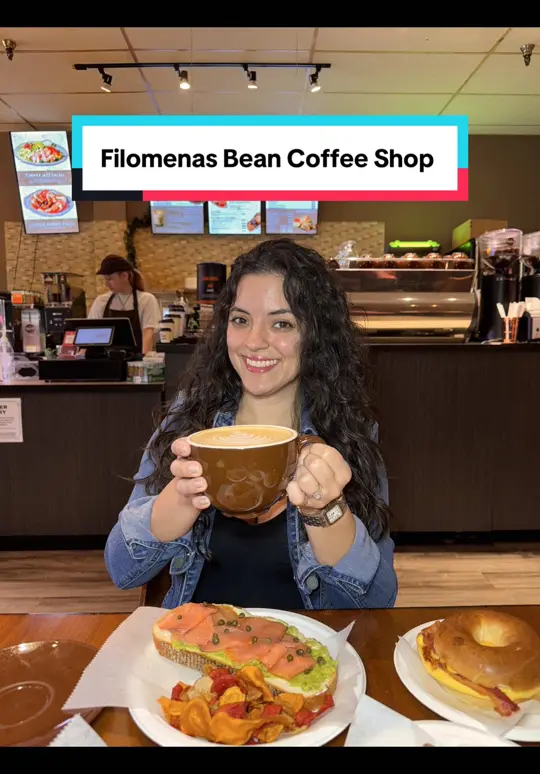 Filomena's Bean Coffee in Davie showing food, white chocolate mocha latte, harmony avocado toast, moon river bagel, turkey jazz club, nutella croissant, beef empanada, video by cassandracraves on TikTok