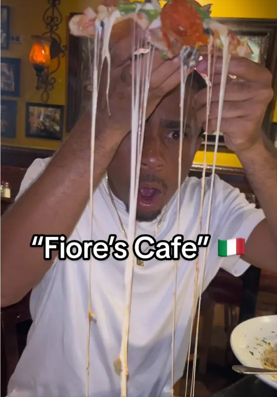 Fiore's Cafe in Ocala showing italian food, garlic bread, caesar salad, supreme pizza, video by micaahwoodley on TikTok