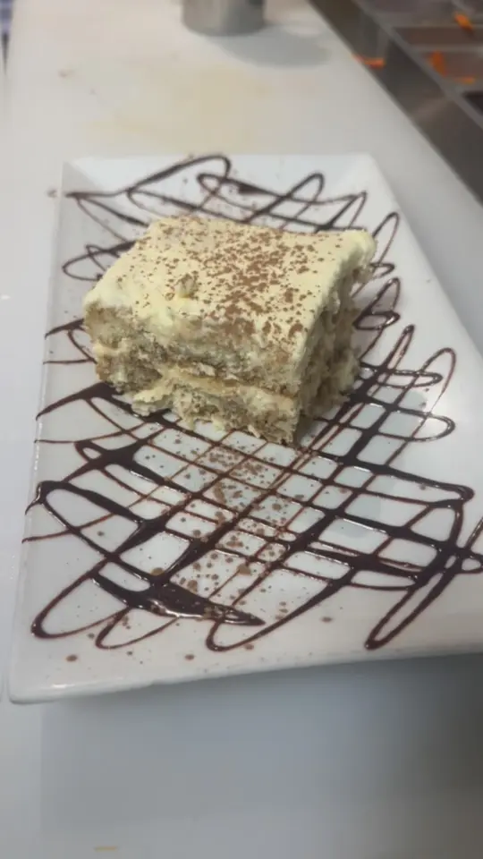 Fiore's Cafe in Ocala showing dessert, tiramisu, video by Fiore’s café on Facebook