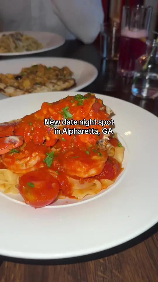 Fiorenza Italian Restaurant in Alpharetta showing restaurant visit, italian food, seafood pasta, branzino, carbonara picci, mezcal cocktail, video by gloriandjustin on TikTok