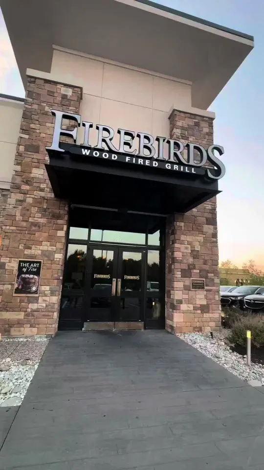 Firebirds Wood Fired Grill in Jacksonville showing food, firebirds roasted chicken, steak frites, video by thefoodhussy on TikTok