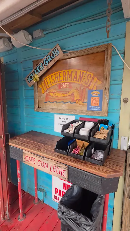 Fisherman's Cafe in Key West showing breakfast, scrambled eggs and bacon, open air atmosphere, historic seaport location, video by Florida Keys Resorts on Facebook