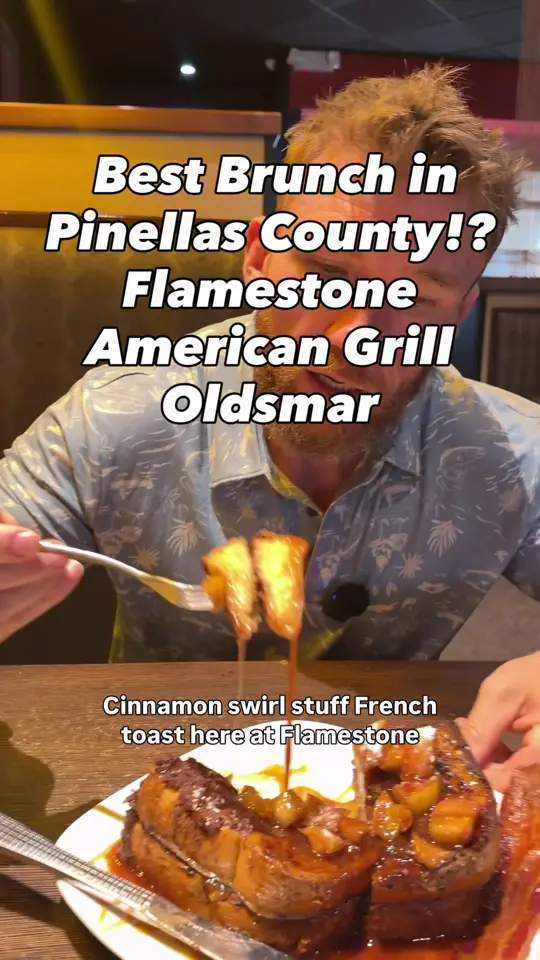 Flamestone American Grill in Oldsmar showing food, cinnamon swirl stuffed french toast, chicken and waffles, brisket benedict, table side guacamole, bottomless mimosas, homemade carrot cake, video by palmharbordad on TikTok