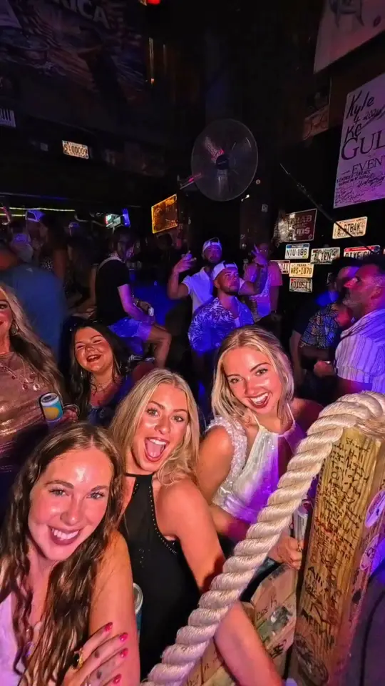 Flora-Bama Lounge Package & Oyster Bar in Pensacola showing bar, drinks, atmosphere, video by Flora-Bama Lounge & Package on Facebook