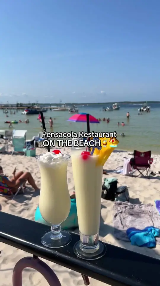 Flounder's Chowder House in Pensacola Beach showing seafood, piña coladas, key lime pie, video by thebucketlistlatina on TikTok
