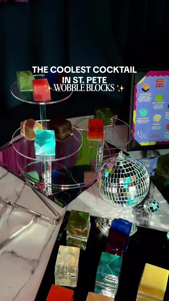 Flute & Dram in St. Petersburg showing cocktail, wobble block, video by eatlocalflorida on TikTok