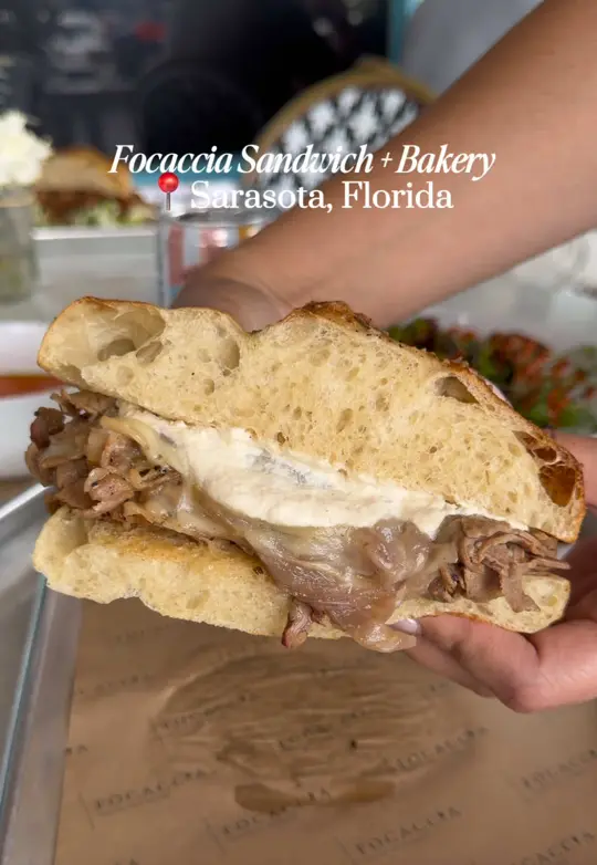  in Florida showing review, visit, food, avocado sandwich, prime rib sandwich, charred artichoke, video by secretsofsrq on TikTok