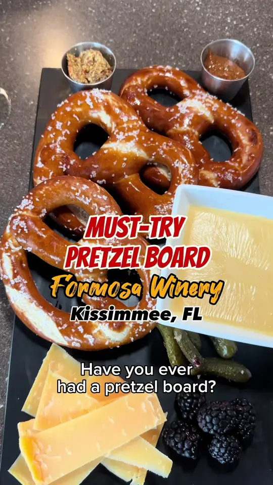 Formosa Winery Tasting House in Kissimmee showing pretzel board, limited-time menu offerings, wine, gift card, specialty drinks, charcuterie, dessert boards, brunch items, video by sunshineandkeylimeblog on TikTok