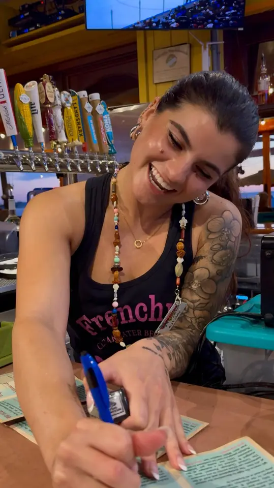 Frenchy's Outpost Bar and Grill in Dunedin showing atmosphere, sunset, beach days, video by Frenchy's Rockaway Grill on Facebook