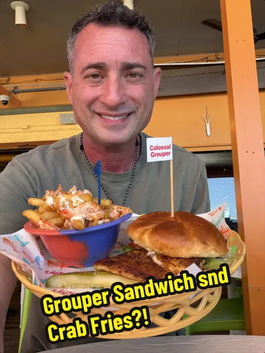 Frenchy's Rockaway Grill in Clearwater showing sandwich, blackened grouper sandwich, crab fries, video by foodiejustice on TikTok