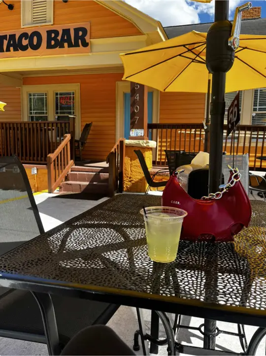 Front Porch Taco Bar in Stone Mountain showing drink, elote, tacos, atmosphere, video by kolormekenn on TikTok