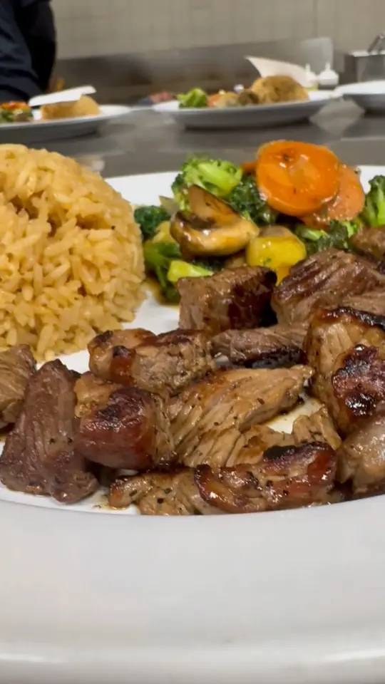 FUJI JAPANESE STEAK HOUSE & SUSHI BAR in Columbus showing hibachi steak, sizzling grill, dinner experience, video by Fuji Japanese Steak House Columbus on Facebook