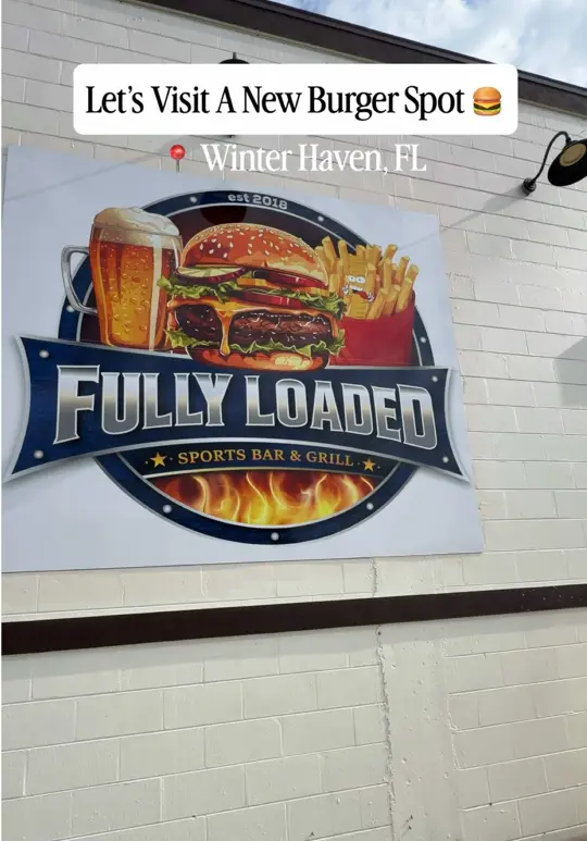 Fully Loaded Bar & Grill in Winter Haven showing review, all american burger, bacon cheese fries, video by ythafinds on TikTok