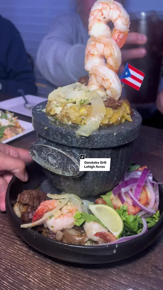 Gandules Grill in Lehigh Acres showing restaurant visit, atmosphere, live music, puerto rican cuisine, video by sunnycoastblog on TikTok