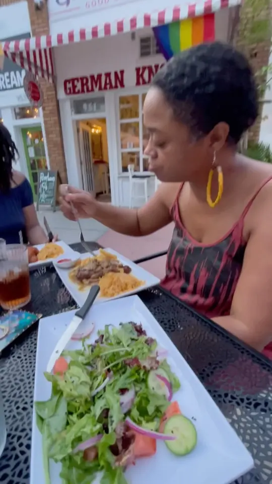 German Knodle in St. Petersburg showing vegan sausage, german potato salad, video by Vegan Soul Foodie on Facebook