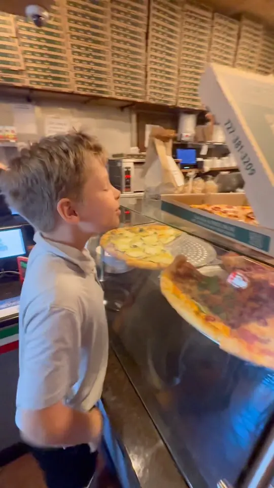 Gianni's NY Pizza in St. Petersburg showing pizza, restaurant visit, video by Loving St Pete on Facebook