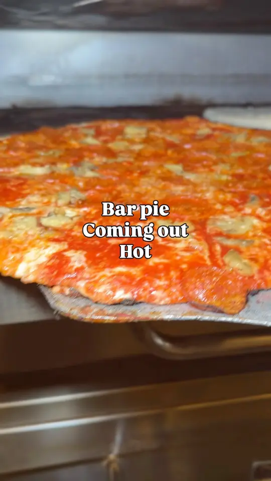 Gino's NY Pizza Bar in Atlanta showing pizza, ultra thin bar pie, video by Gino's NY Style Pizzeria & Restaurant on Facebook