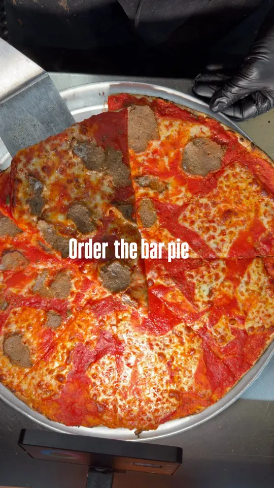 Gino's NY Pizza Bar in Atlanta showing pizza, meatballs, video by Gino's NY Style Pizzeria & Restaurant on Facebook